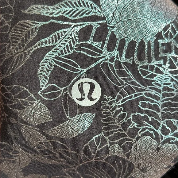 Lululemon Wunder Train High-Rise Tight 25" *Foil
Logo Flourish Black Iridescent - Picture 8 of 11